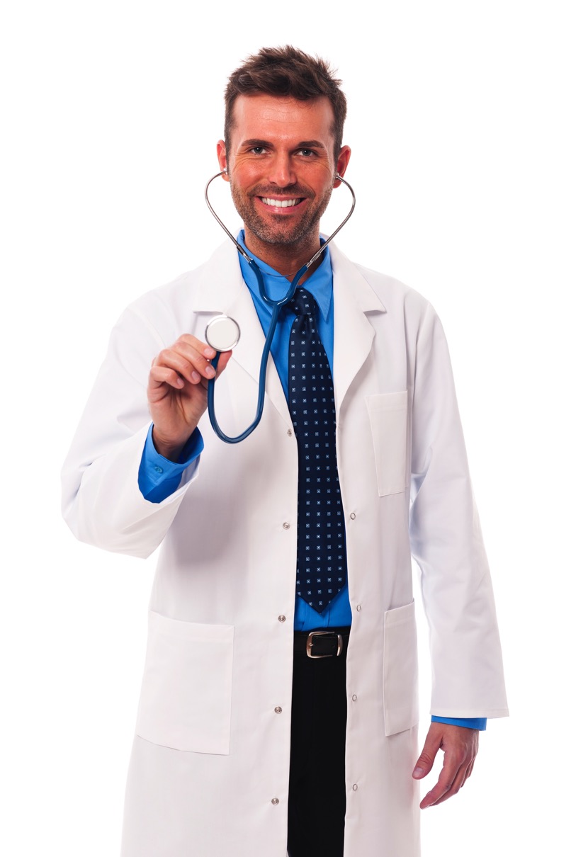 Candid male doctor holding stethoscope